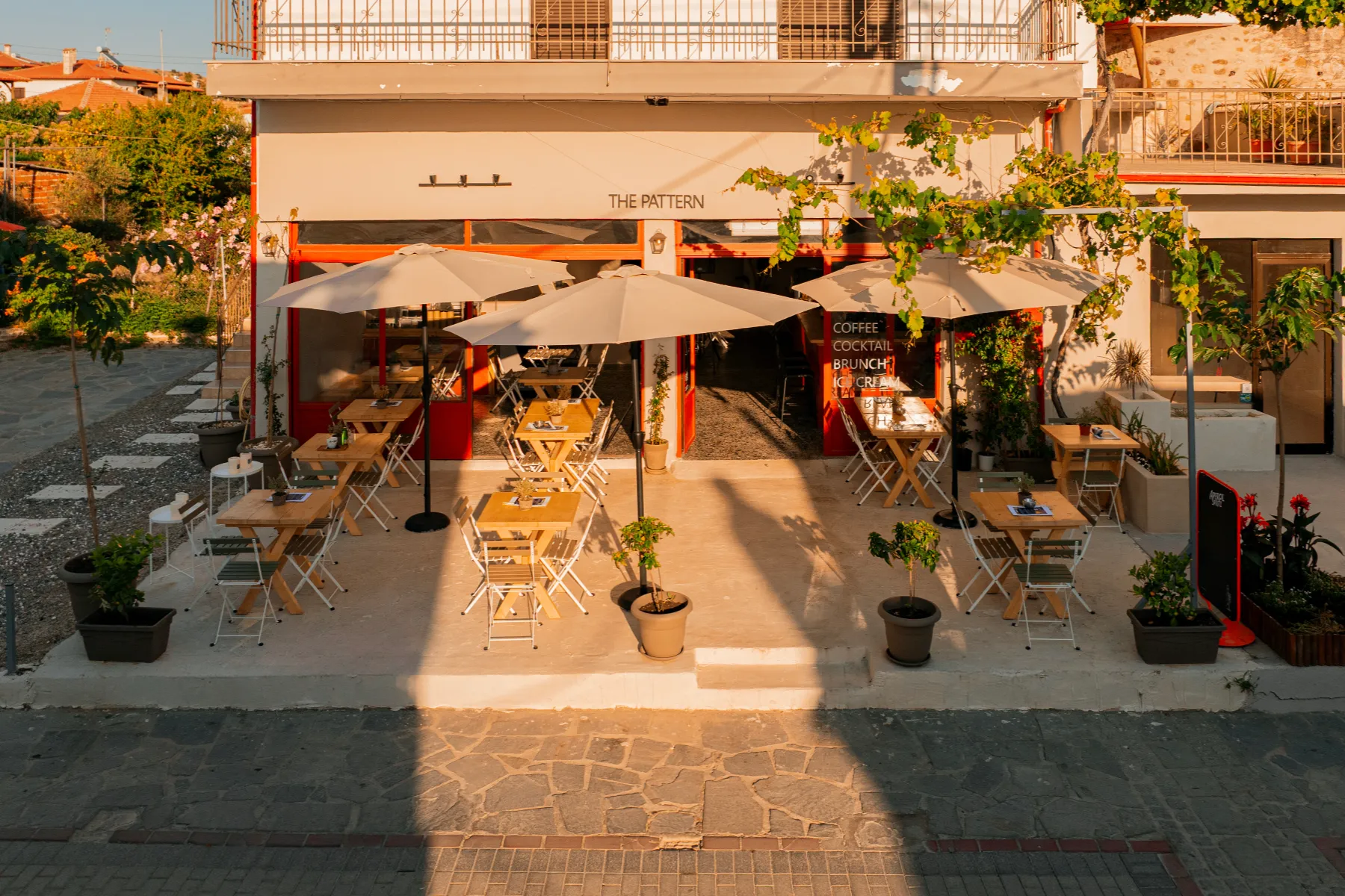 Terrace of The Pattern Bistro in Nikiti Old Town, showing specialty coffee and a relaxed atmosphere